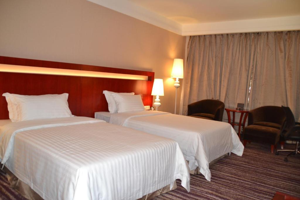 Elite Garden Hotel Yangshuo Rom bilde